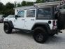 2015 WHITE Jeep Wrangler Unlimited Rubicon 4WD (1C4BJWFG6FL) with an 3.6L V6 DOHC 24V FFV engine, Automatic transmission, located at 15016 S Hwy 231, Midland City, AL, 36350, (334) 983-3001, 31.306210, -85.495277 - Photo#7