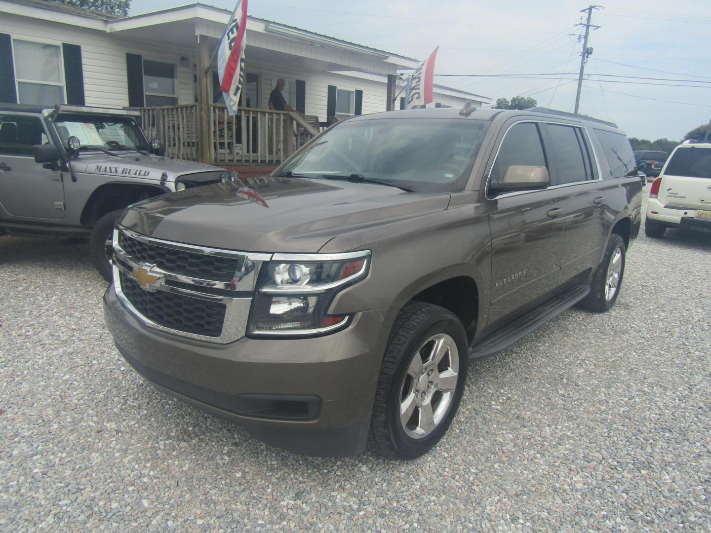 2016 Brown Chevrolet Suburban LS 2WD (1GNSCGKC3GR) with an 5.3L V8 OHV 16V engine, Automatic transmission, located at 15016 S Hwy 231, Midland City, AL, 36350, (334) 983-3001, 31.306210, -85.495277 - Photo#2