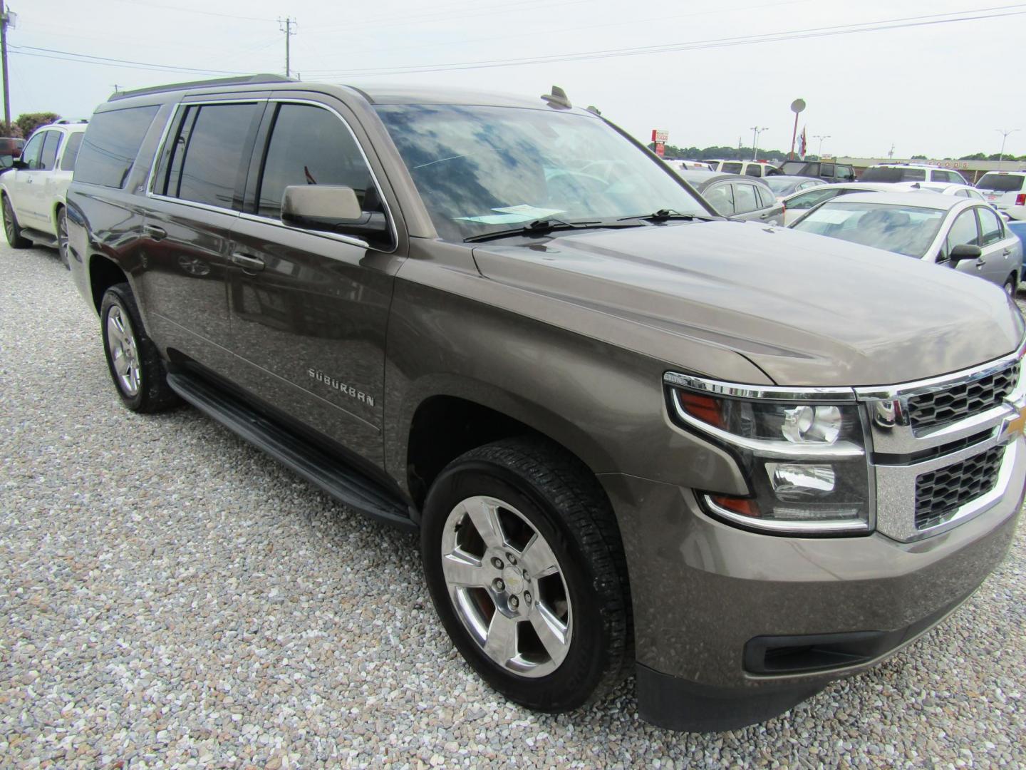 2016 Brown Chevrolet Suburban LS 2WD (1GNSCGKC3GR) with an 5.3L V8 OHV 16V engine, Automatic transmission, located at 15016 S Hwy 231, Midland City, AL, 36350, (334) 983-3001, 31.306210, -85.495277 - Photo#0