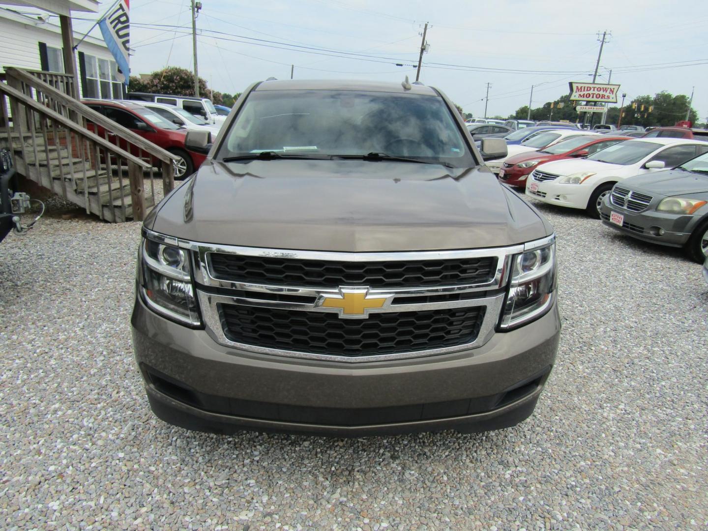 2016 Brown Chevrolet Suburban LS 2WD (1GNSCGKC3GR) with an 5.3L V8 OHV 16V engine, Automatic transmission, located at 15016 S Hwy 231, Midland City, AL, 36350, (334) 983-3001, 31.306210, -85.495277 - Photo#1