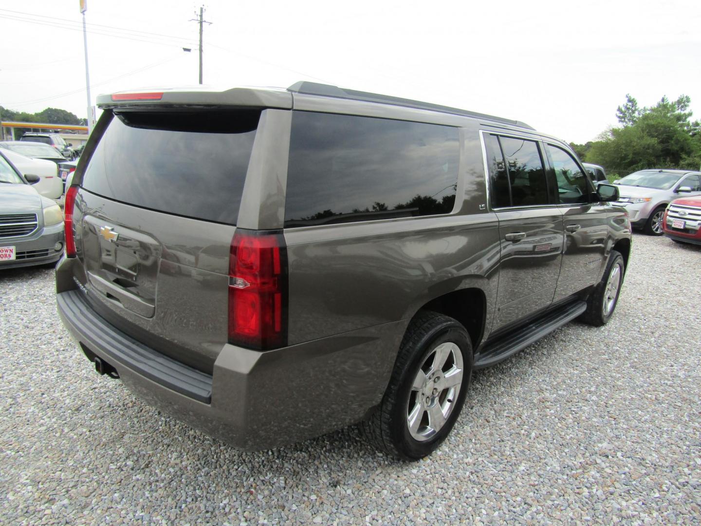 2016 Brown Chevrolet Suburban LS 2WD (1GNSCGKC3GR) with an 5.3L V8 OHV 16V engine, Automatic transmission, located at 15016 S Hwy 231, Midland City, AL, 36350, (334) 983-3001, 31.306210, -85.495277 - Photo#7