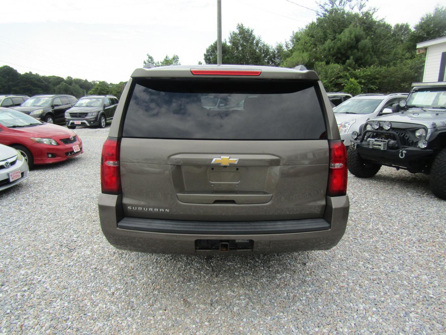 2016 Brown Chevrolet Suburban LS 2WD (1GNSCGKC3GR) with an 5.3L V8 OHV 16V engine, Automatic transmission, located at 15016 S Hwy 231, Midland City, AL, 36350, (334) 983-3001, 31.306210, -85.495277 - Photo#6