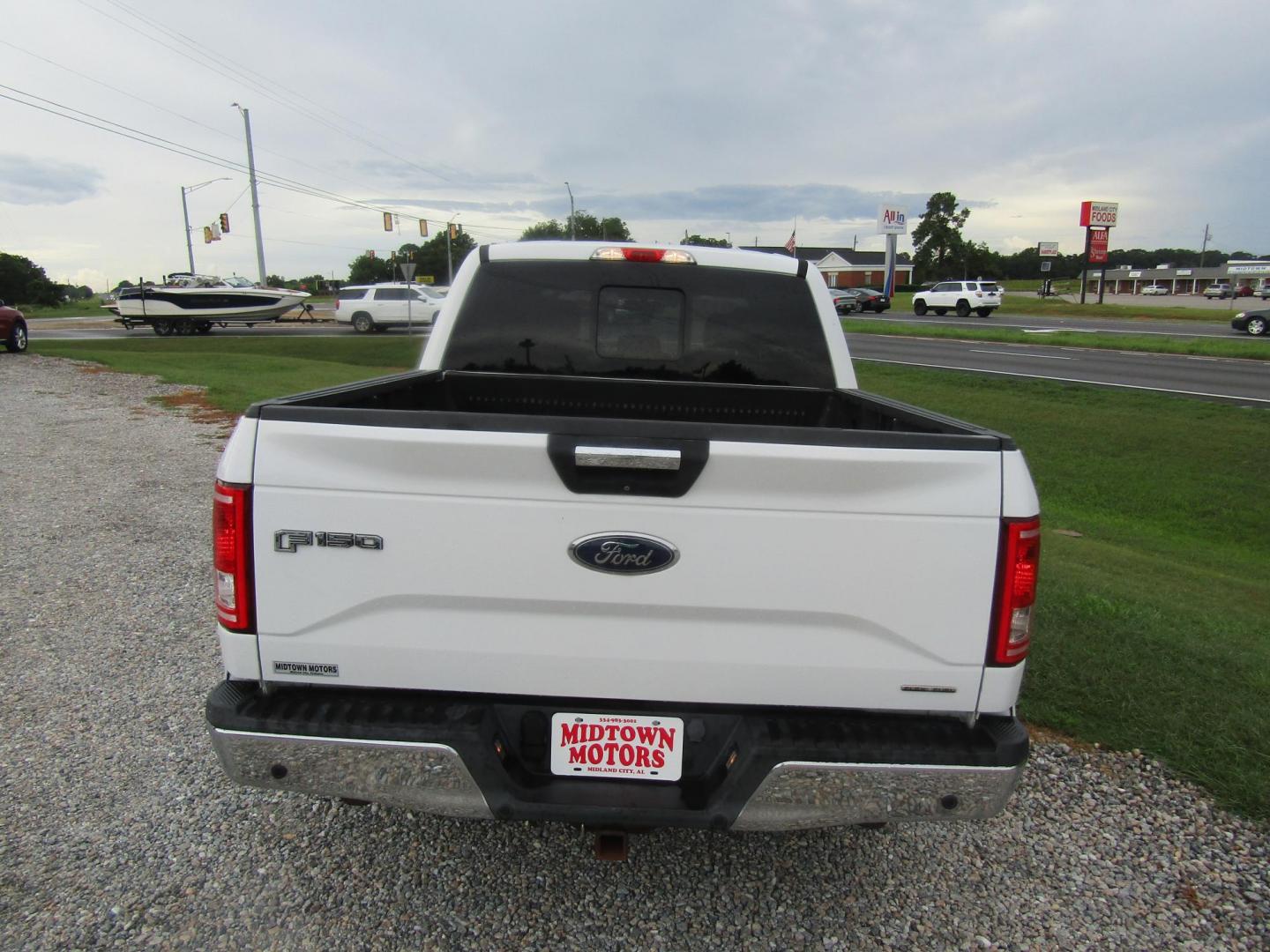 2015 WHITE Ford F-150 King-Ranch SuperCrew 5.5-ft. Bed 2WD (1FTEW1CF9FF) with an 5.0L V8 engine, Automatic transmission, located at 15016 S Hwy 231, Midland City, AL, 36350, (334) 983-3001, 31.306210, -85.495277 - Photo#6
