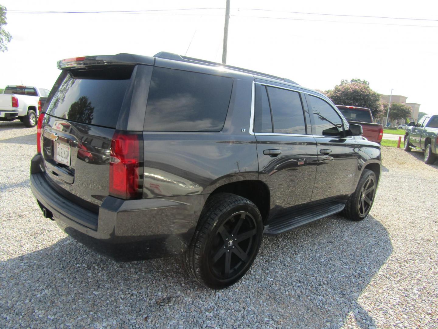 2017 Black Chevrolet Tahoe LT 2WD (1GNSCBKC5HR) with an 5.3L V8 OHV 16V engine, Automatic transmission, located at 15016 S Hwy 231, Midland City, AL, 36350, (334) 983-3001, 31.306210, -85.495277 - Photo#6