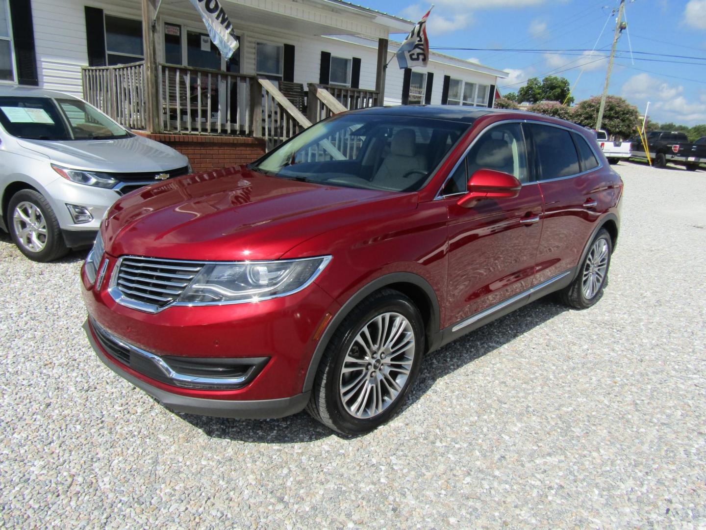 2016 Red Lincoln MKX Reserve (2LMTJ6LP5GB) with an 2.7L V6 DOHC 24V engine, Automatic transmission, located at 15016 S Hwy 231, Midland City, AL, 36350, (334) 983-3001, 31.306210, -85.495277 - Photo#2