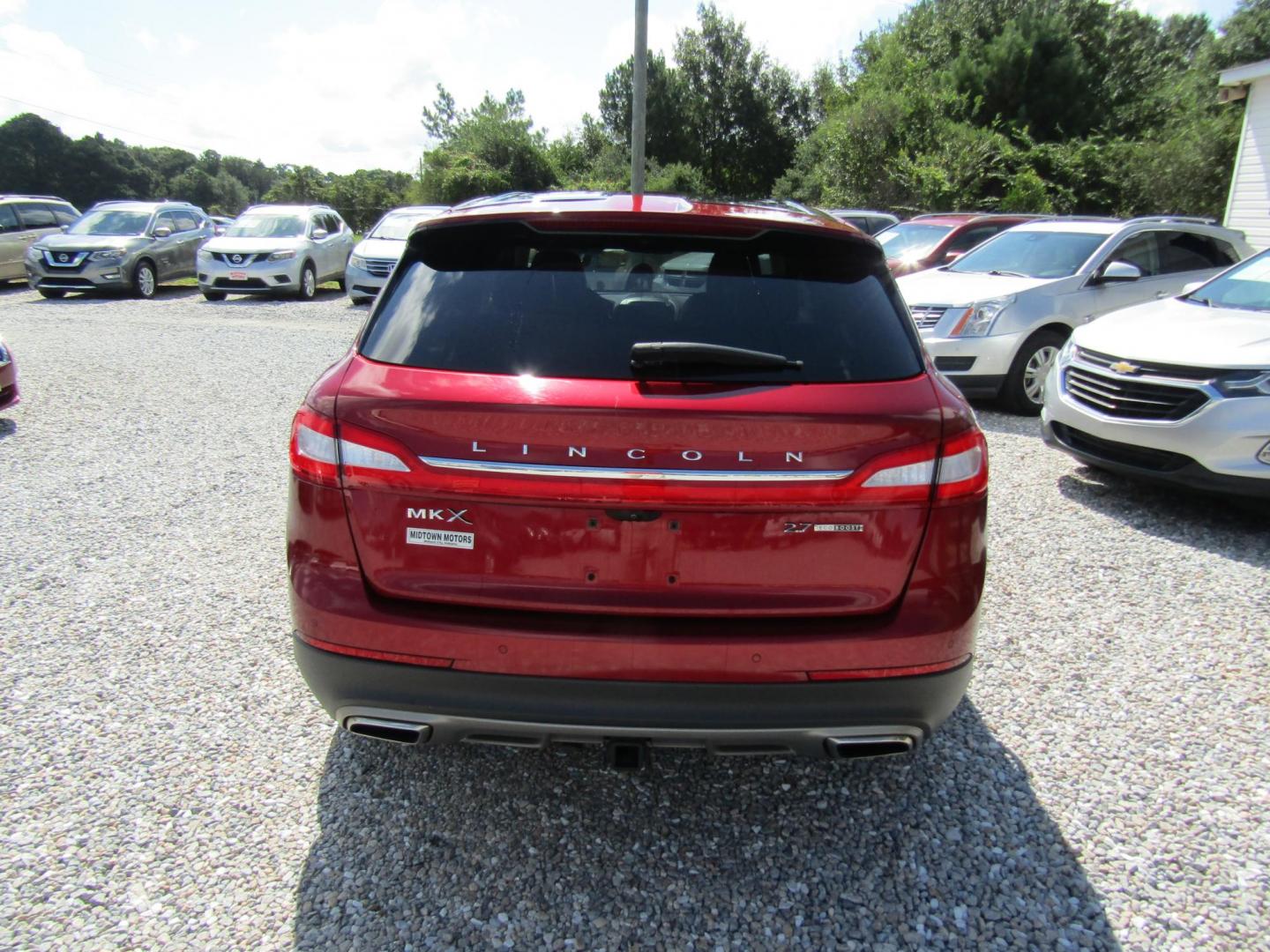 2016 Red Lincoln MKX Reserve (2LMTJ6LP5GB) with an 2.7L V6 DOHC 24V engine, Automatic transmission, located at 15016 S Hwy 231, Midland City, AL, 36350, (334) 983-3001, 31.306210, -85.495277 - Photo#6