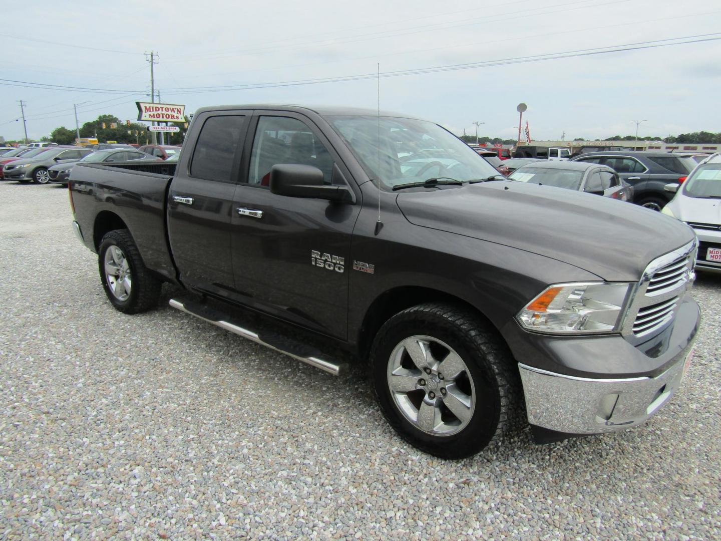 2015 DK GRAY RAM 1500 SLT Quad Cab 4WD (1C6RR7GT1FS) with an 5.7L V8 OHV 16V engine, Automatic transmission, located at 15016 S Hwy 231, Midland City, AL, 36350, (334) 983-3001, 31.306210, -85.495277 - Photo#0