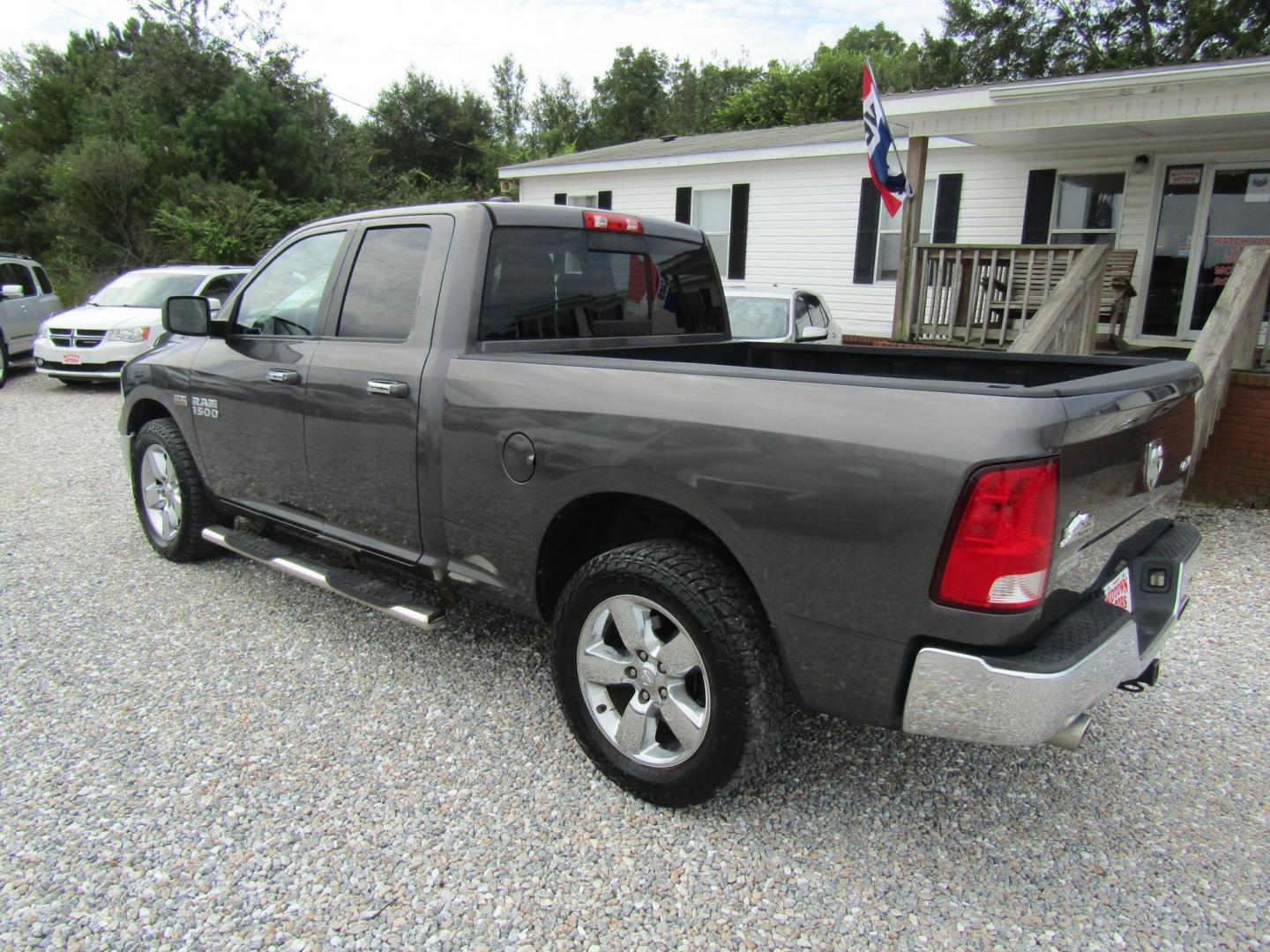 2015 DK GRAY RAM 1500 SLT Quad Cab 4WD (1C6RR7GT1FS) with an 5.7L V8 OHV 16V engine, Automatic transmission, located at 15016 S Hwy 231, Midland City, AL, 36350, (334) 983-3001, 31.306210, -85.495277 - Photo#5