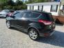 2013 Black Ford Escape SE FWD (1FMCU0GX9DU) with an 1.6L L4 DOHC 16V engine, Automatic transmission, located at 15016 S Hwy 231, Midland City, AL, 36350, (334) 983-3001, 31.306210, -85.495277 - Photo#5