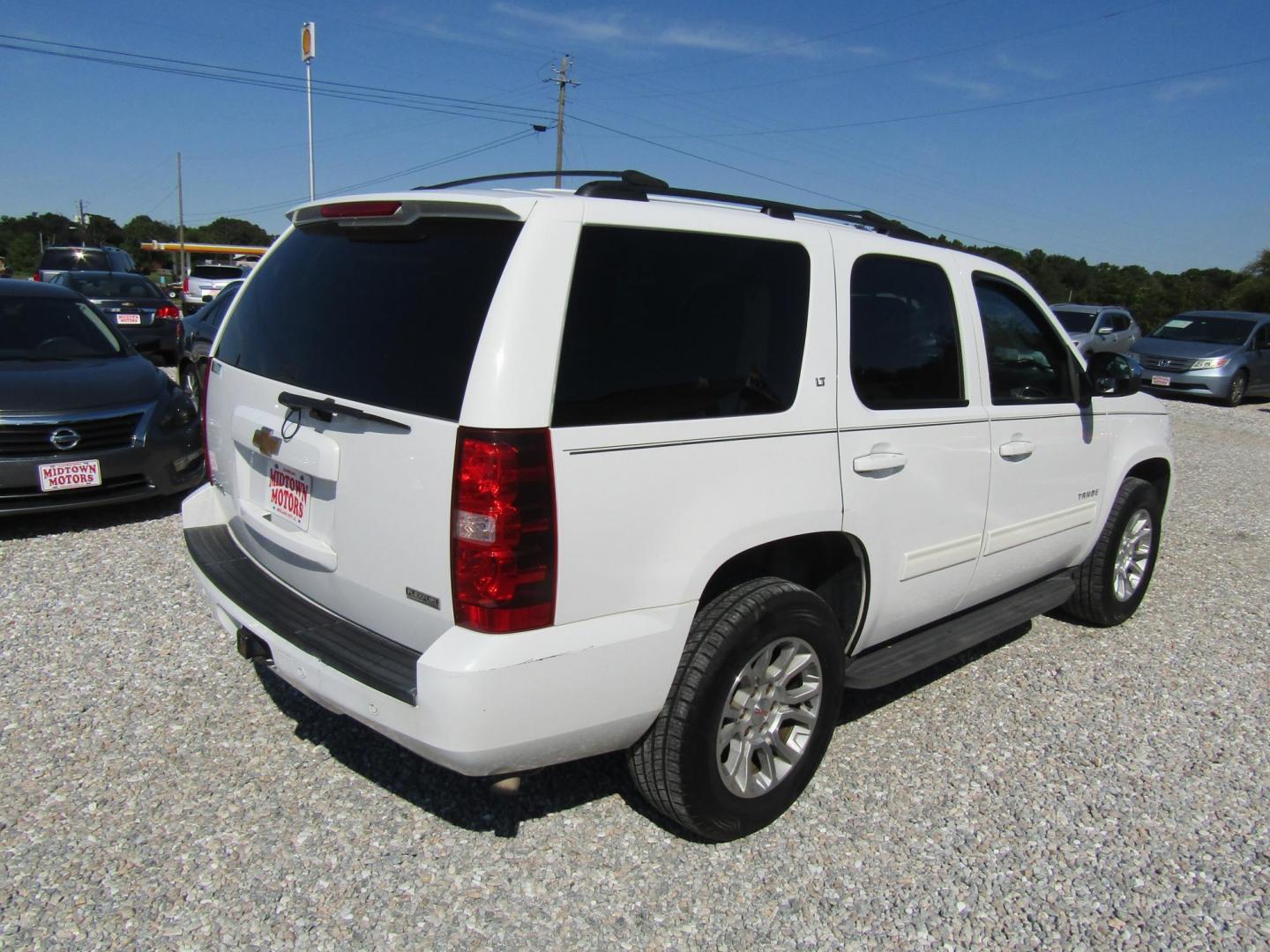 2012 WHITE Chevrolet Tahoe LT 2WD (1GNSCBE03CR) with an 5.3L V8 OHV 16V FFV engine, Automatic transmission, located at 15016 S Hwy 231, Midland City, AL, 36350, (334) 983-3001, 31.306210, -85.495277 - Photo#7