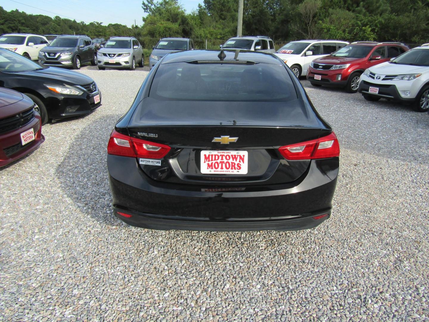 2019 Black Chevrolet Malibu LS (1G1ZB5ST5KF) with an 1.5L L4 DOHC 16V engine, Automatic transmission, located at 15016 S Hwy 231, Midland City, AL, 36350, (334) 983-3001, 31.306210, -85.495277 - Photo#6
