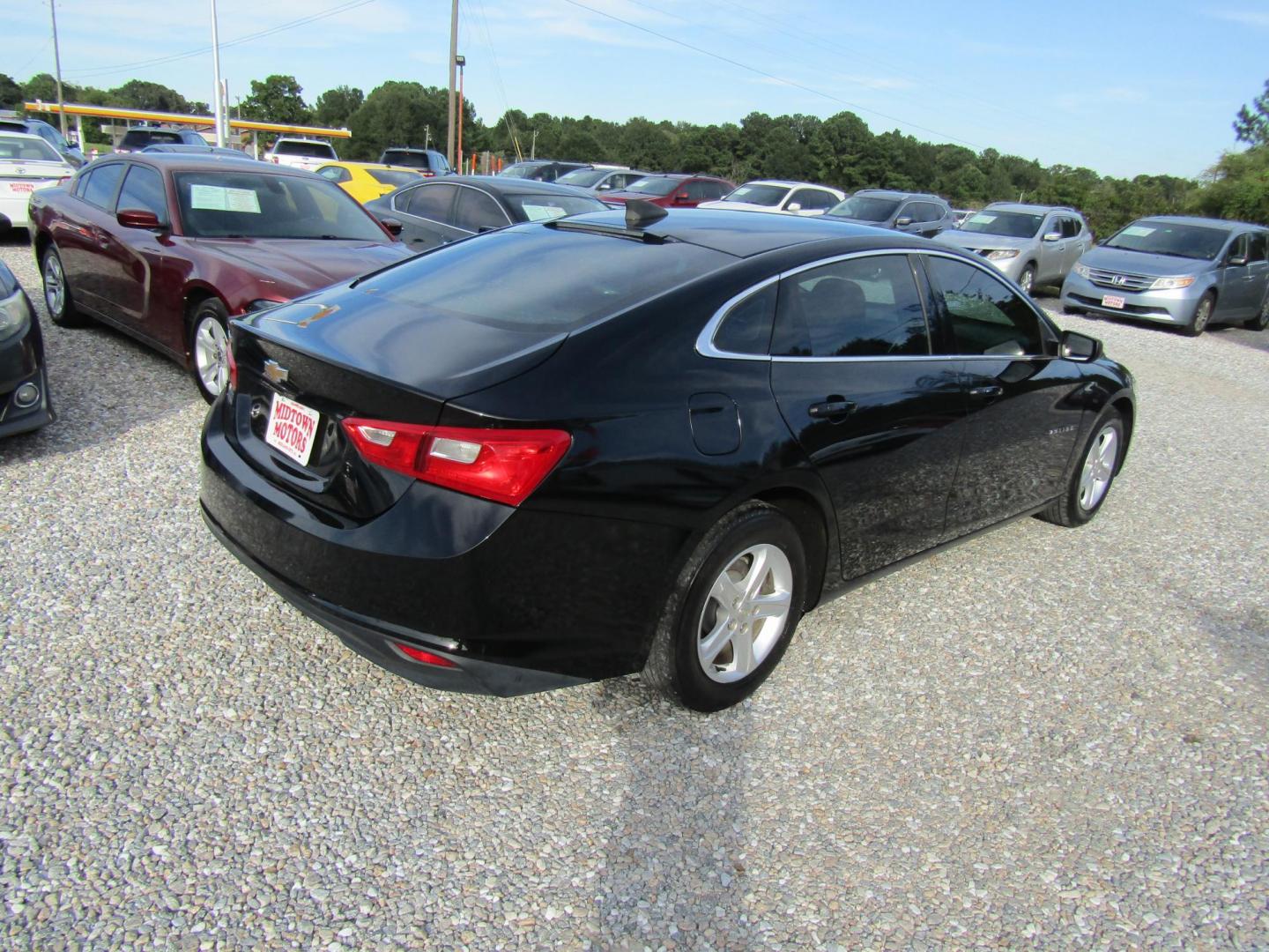 2019 Black Chevrolet Malibu LS (1G1ZB5ST5KF) with an 1.5L L4 DOHC 16V engine, Automatic transmission, located at 15016 S Hwy 231, Midland City, AL, 36350, (334) 983-3001, 31.306210, -85.495277 - Photo#7