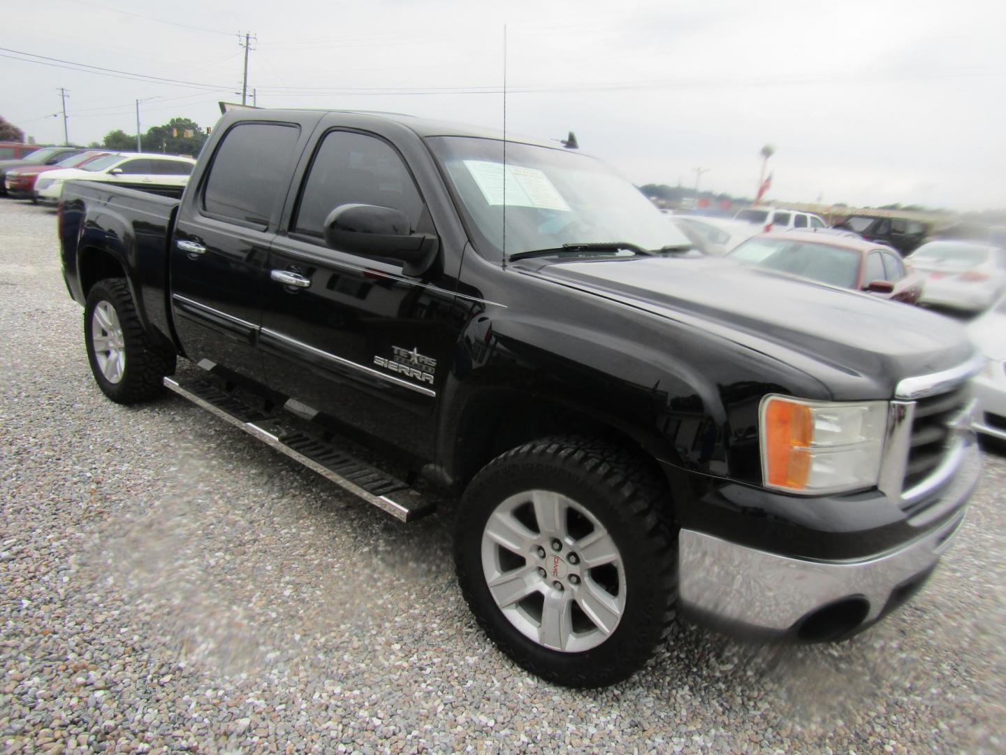 2013 Black GMC Sierra 1500 SLE Crew Cab 2WD (3GTP1VE03DG) with an 5.3L V8 OHV 16V FFV engine, Automatic transmission, located at 15016 S Hwy 231, Midland City, AL, 36350, (334) 983-3001, 31.306210, -85.495277 - Photo#0