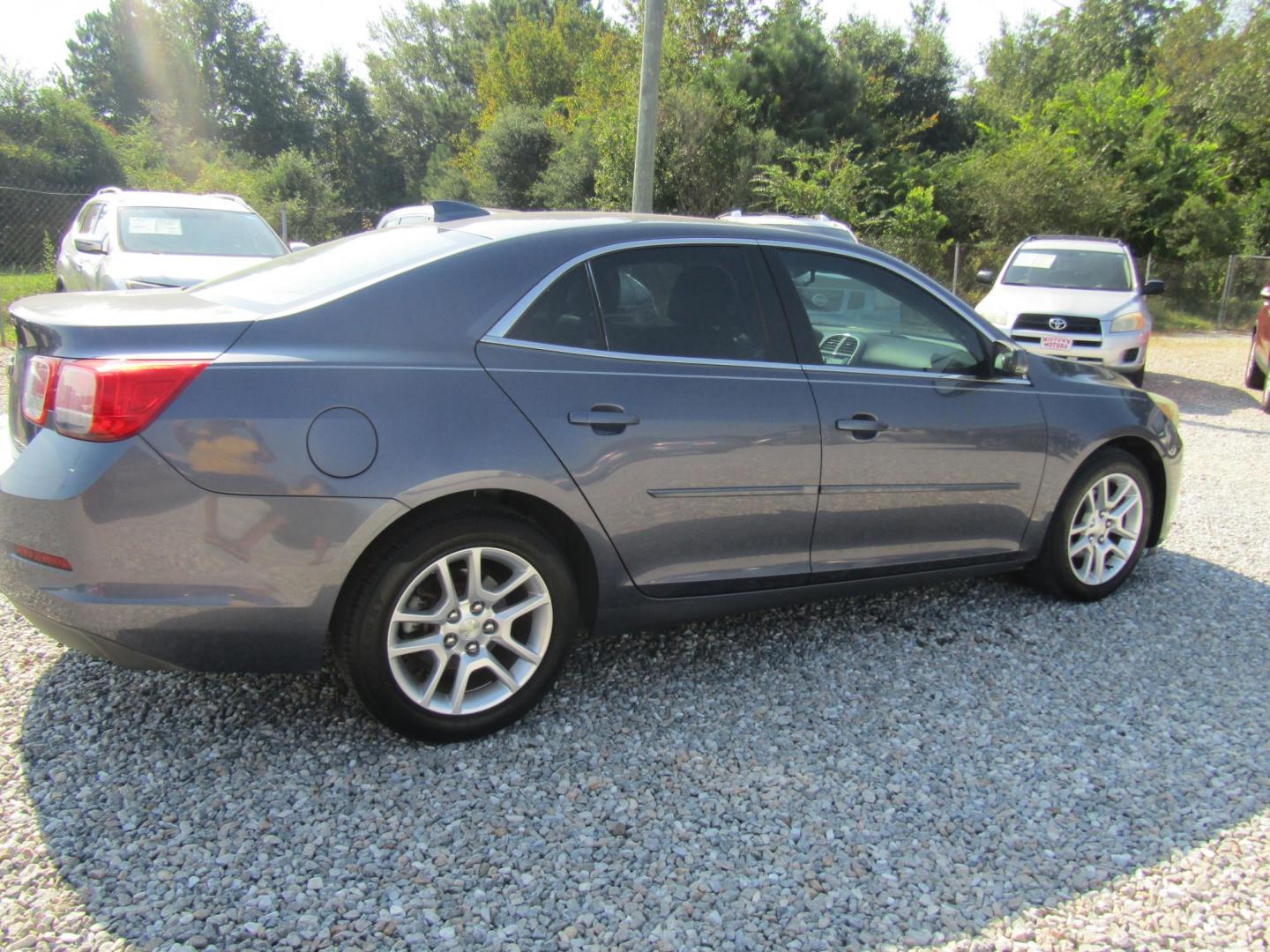 2015 Blue Chevrolet Malibu 1LT (1G11C5SL6FF) with an 2.5L L4 DOHC 16V engine, Automatic transmission, located at 15016 S Hwy 231, Midland City, AL, 36350, (334) 983-3001, 31.306210, -85.495277 - Photo#5