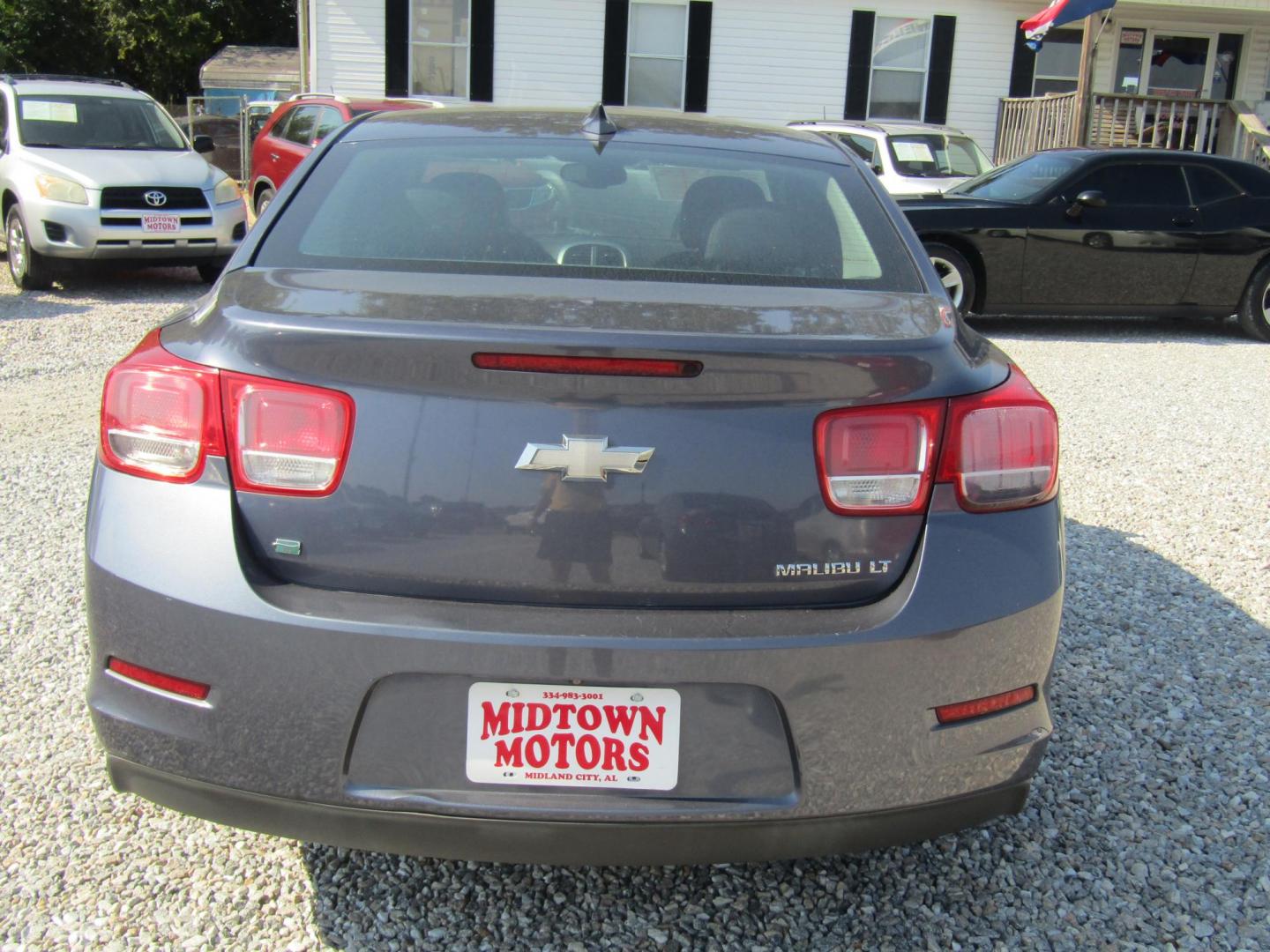 2015 Blue Chevrolet Malibu 1LT (1G11C5SL6FF) with an 2.5L L4 DOHC 16V engine, Automatic transmission, located at 15016 S Hwy 231, Midland City, AL, 36350, (334) 983-3001, 31.306210, -85.495277 - Photo#6