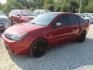 2011 Red Ford Focus SES Sedan (1FAHP3GN1BW) with an 2.0L L4 DOHC 16V engine, Automatic transmission, located at 15016 S Hwy 231, Midland City, AL, 36350, (334) 983-3001, 31.306210, -85.495277 - Photo#2