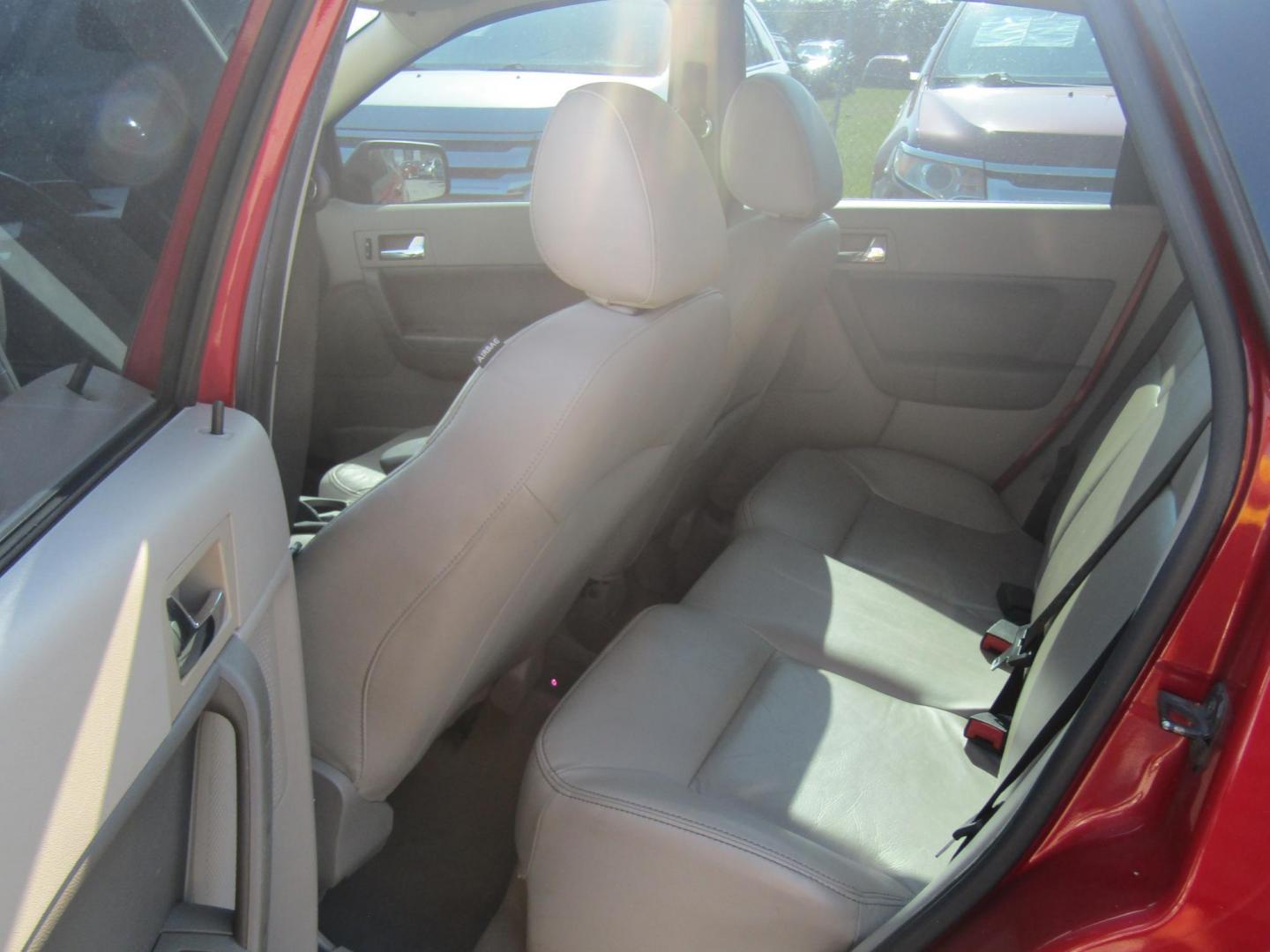 2011 Red Ford Focus SES Sedan (1FAHP3GN1BW) with an 2.0L L4 DOHC 16V engine, Automatic transmission, located at 15016 S Hwy 231, Midland City, AL, 36350, (334) 983-3001, 31.306210, -85.495277 - Photo#7