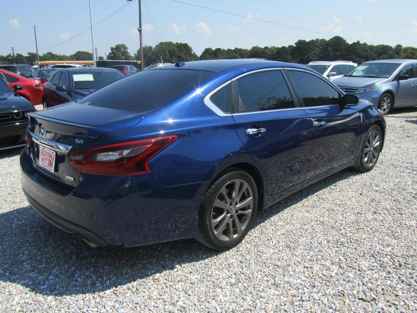 2018 Blue Nissan Altima 2.5 (1N4AL3APXJC) with an 2.5L L4 DOHC 16V engine, Automatic transmission, located at 15016 S Hwy 231, Midland City, AL, 36350, (334) 983-3001, 31.306210, -85.495277 - Photo#4