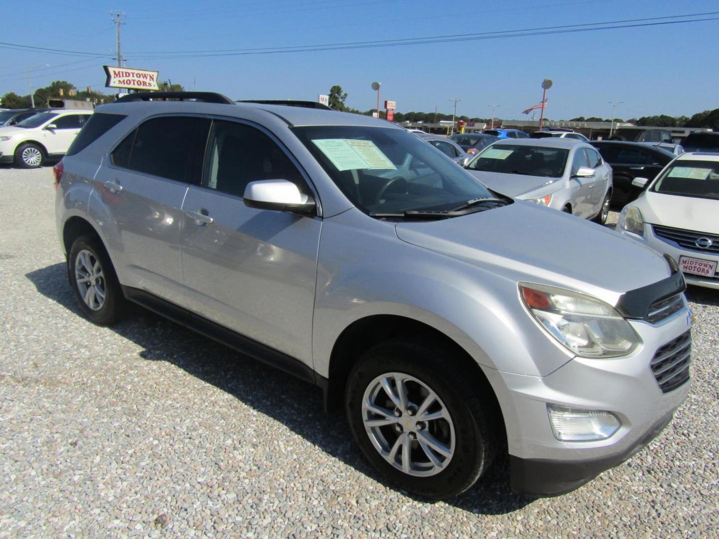 2016 Silver Chevrolet Equinox LT 2WD (1GNALCEK4GZ) with an 2.4L L4 DOHC 16V FFV engine, Automatic transmission, located at 15016 S Hwy 231, Midland City, AL, 36350, (334) 983-3001, 31.306210, -85.495277 - Photo#0