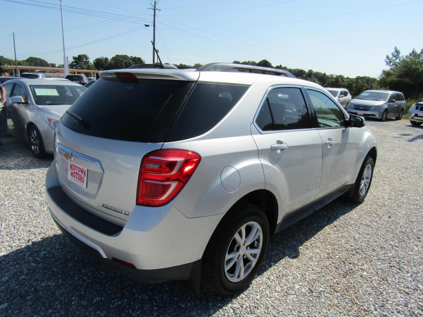 2016 Silver Chevrolet Equinox LT 2WD (1GNALCEK4GZ) with an 2.4L L4 DOHC 16V FFV engine, Automatic transmission, located at 15016 S Hwy 231, Midland City, AL, 36350, (334) 983-3001, 31.306210, -85.495277 - Photo#5