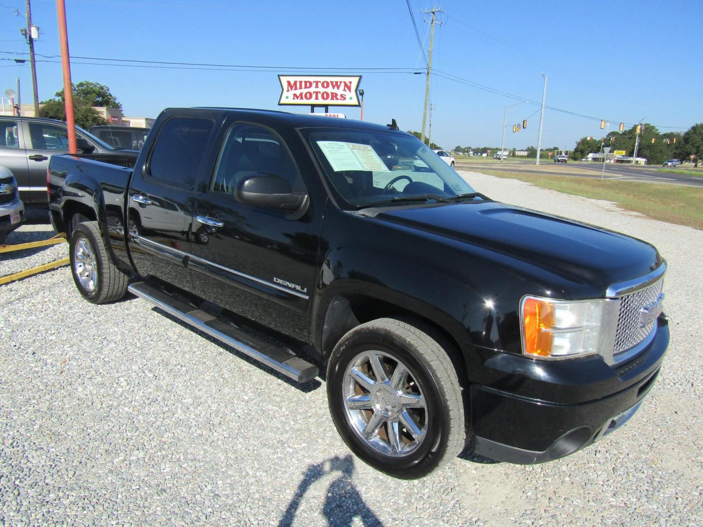 2012 Black GMC Sierra 1500 Denali Crew Cab 4WD (3GTP2XE25CG) with an 6.2L V8 OHV 16V FFV engine, Automatic transmission, located at 15016 S Hwy 231, Midland City, AL, 36350, (334) 983-3001, 31.306210, -85.495277 - Photo#0