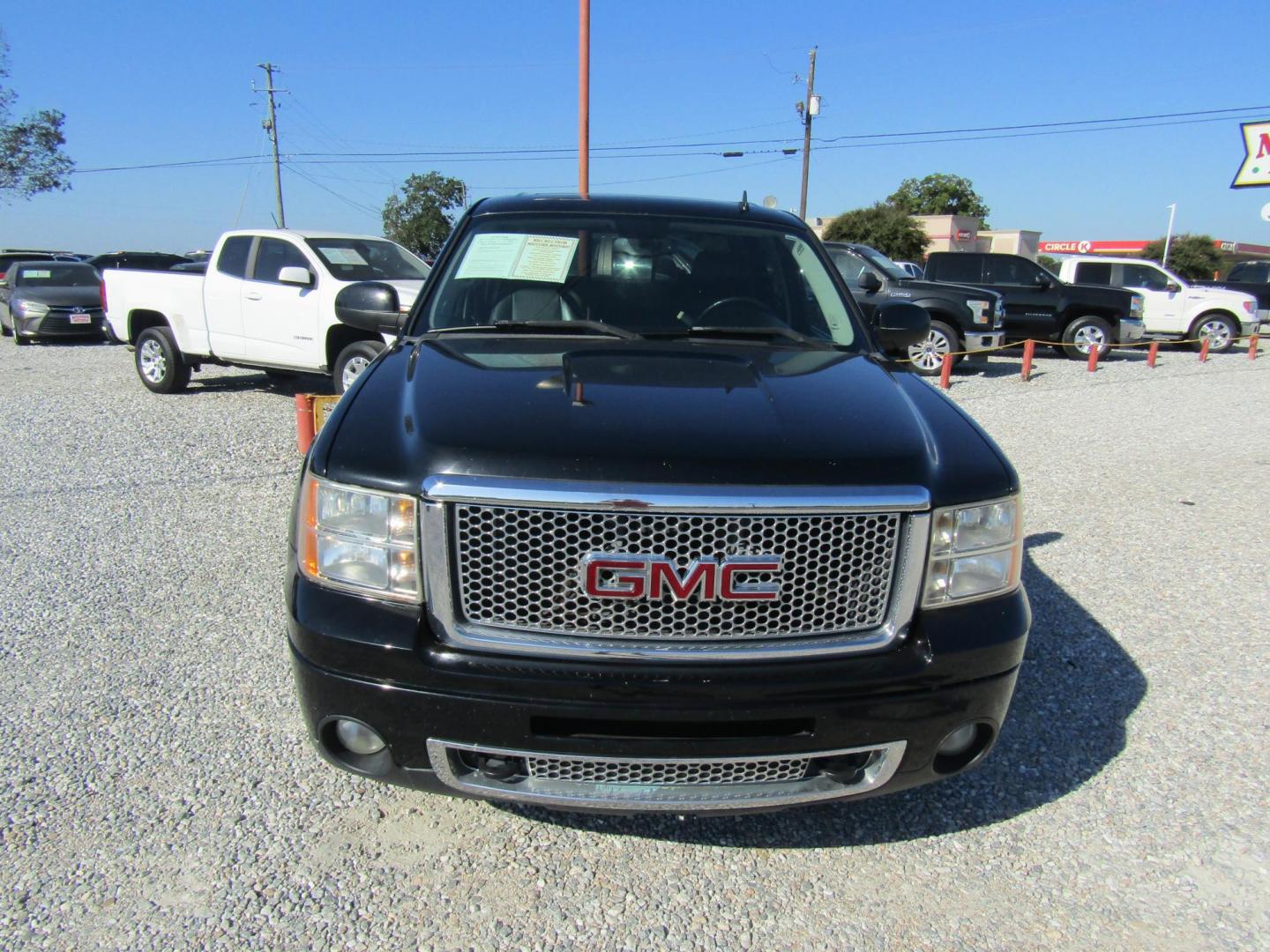 2012 Black GMC Sierra 1500 Denali Crew Cab 4WD (3GTP2XE25CG) with an 6.2L V8 OHV 16V FFV engine, Automatic transmission, located at 15016 S Hwy 231, Midland City, AL, 36350, (334) 983-3001, 31.306210, -85.495277 - Photo#1