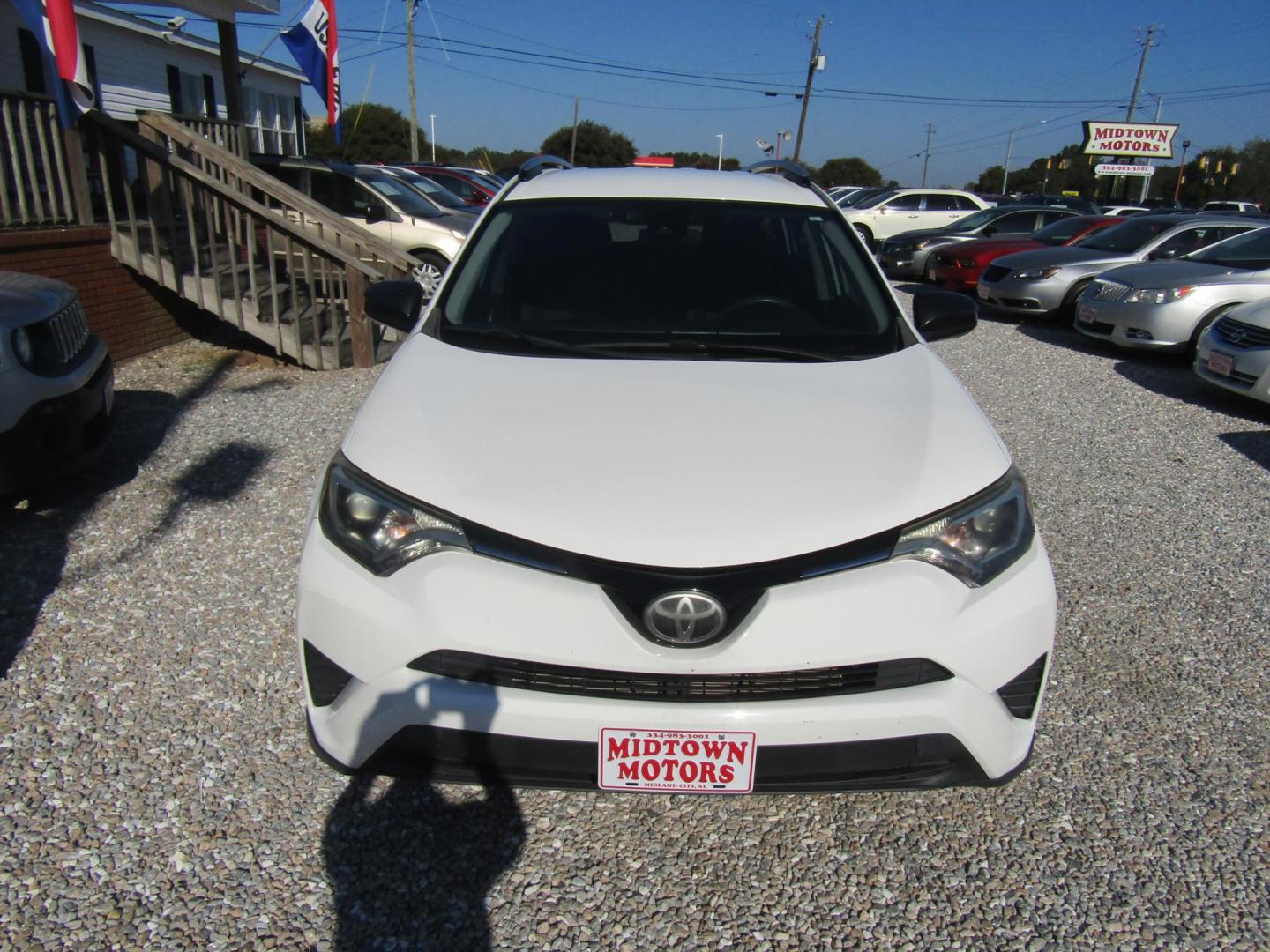 2018 WHITE Toyota RAV4 LE FWD (JTMZFREV6JJ) with an 2.5L L4 DOHC 16V engine, Automatic transmission, located at 15016 S Hwy 231, Midland City, AL, 36350, (334) 983-3001, 31.306210, -85.495277 - Photo#1