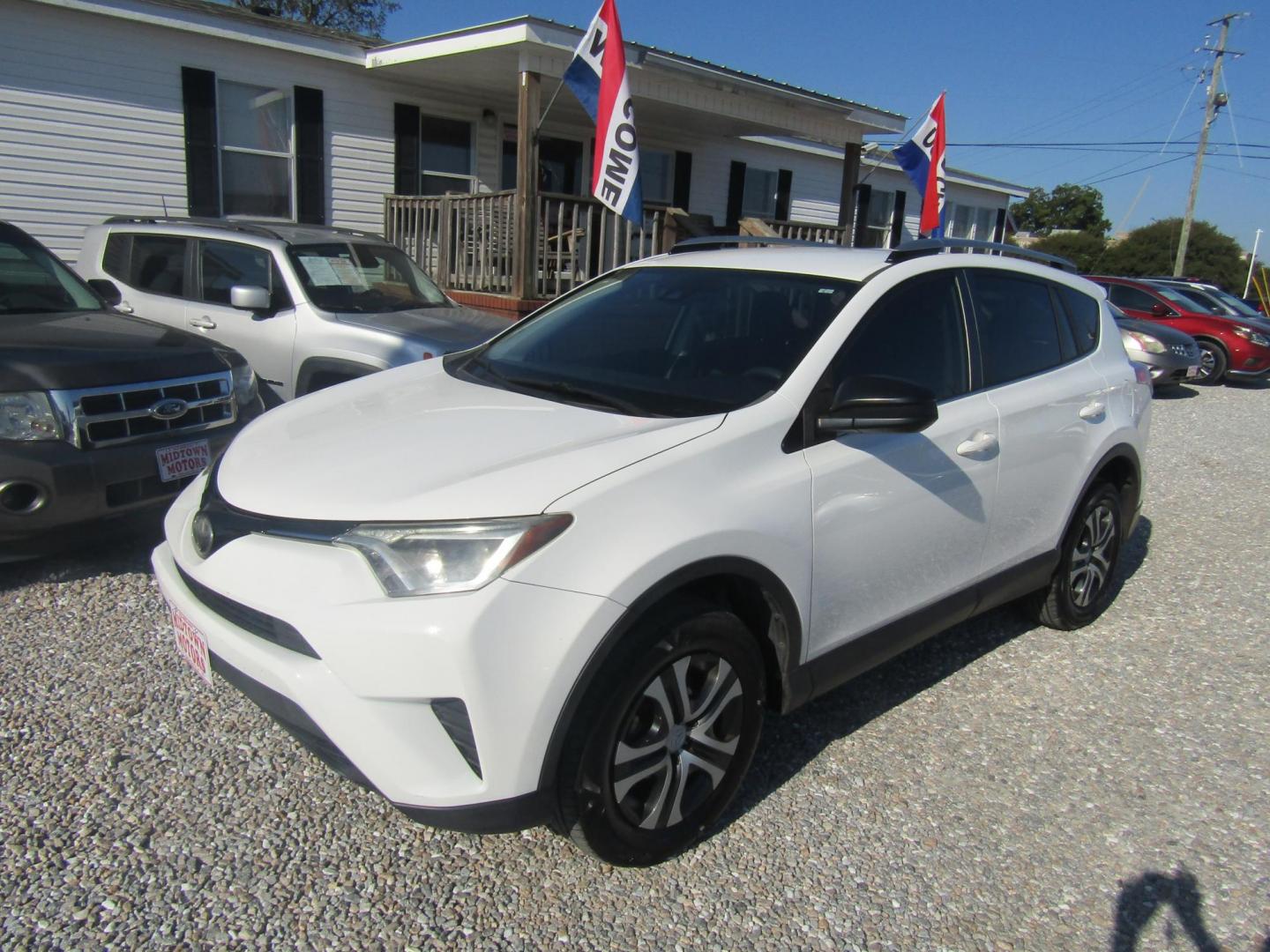 2018 WHITE Toyota RAV4 LE FWD (JTMZFREV6JJ) with an 2.5L L4 DOHC 16V engine, Automatic transmission, located at 15016 S Hwy 231, Midland City, AL, 36350, (334) 983-3001, 31.306210, -85.495277 - Photo#2