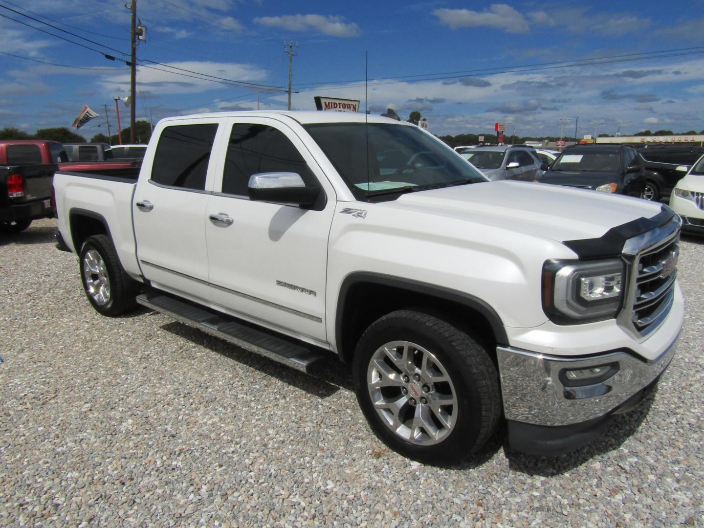 2016 WHITE GMC Sierra 1500 SLT Crew Cab Long Box 4WD (3GTU2NEC7GG) with an 5.3L V8 OHV 16V engine, Automatic transmission, located at 15016 S Hwy 231, Midland City, AL, 36350, (334) 983-3001, 31.306210, -85.495277 - Photo#0