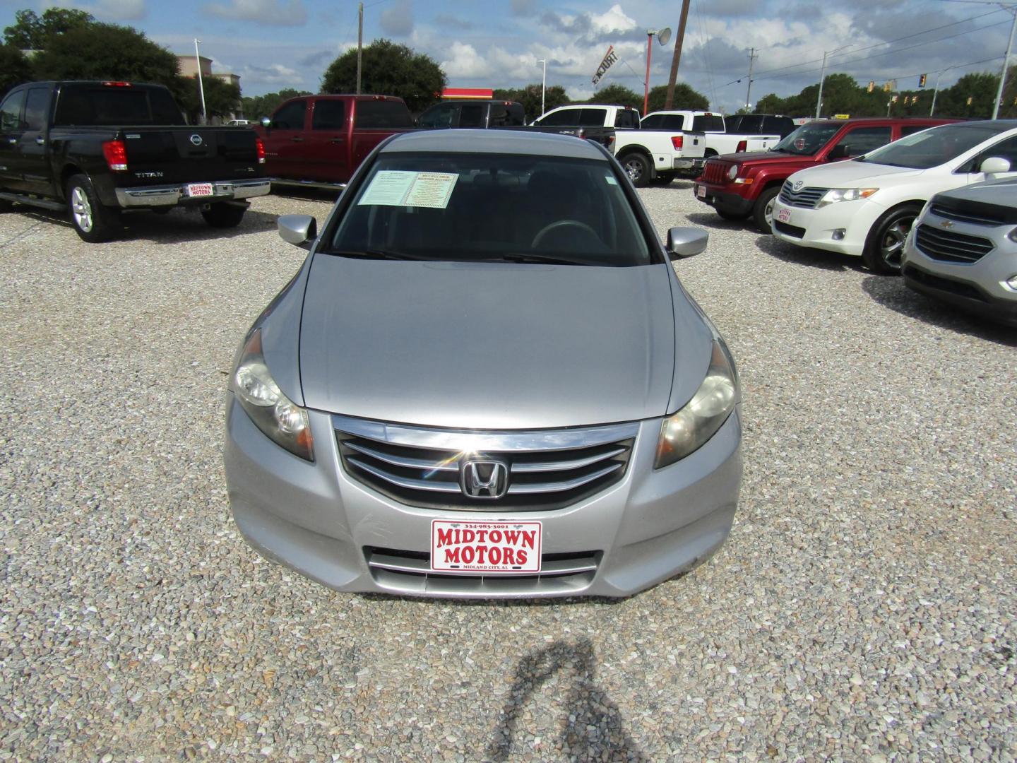2012 Silver Honda Accord LX Sedan AT (1HGCP2F31CA) with an 2.4L L4 DOHC 16V engine, Automatic transmission, located at 15016 S Hwy 231, Midland City, AL, 36350, (334) 983-3001, 31.306210, -85.495277 - Photo#1