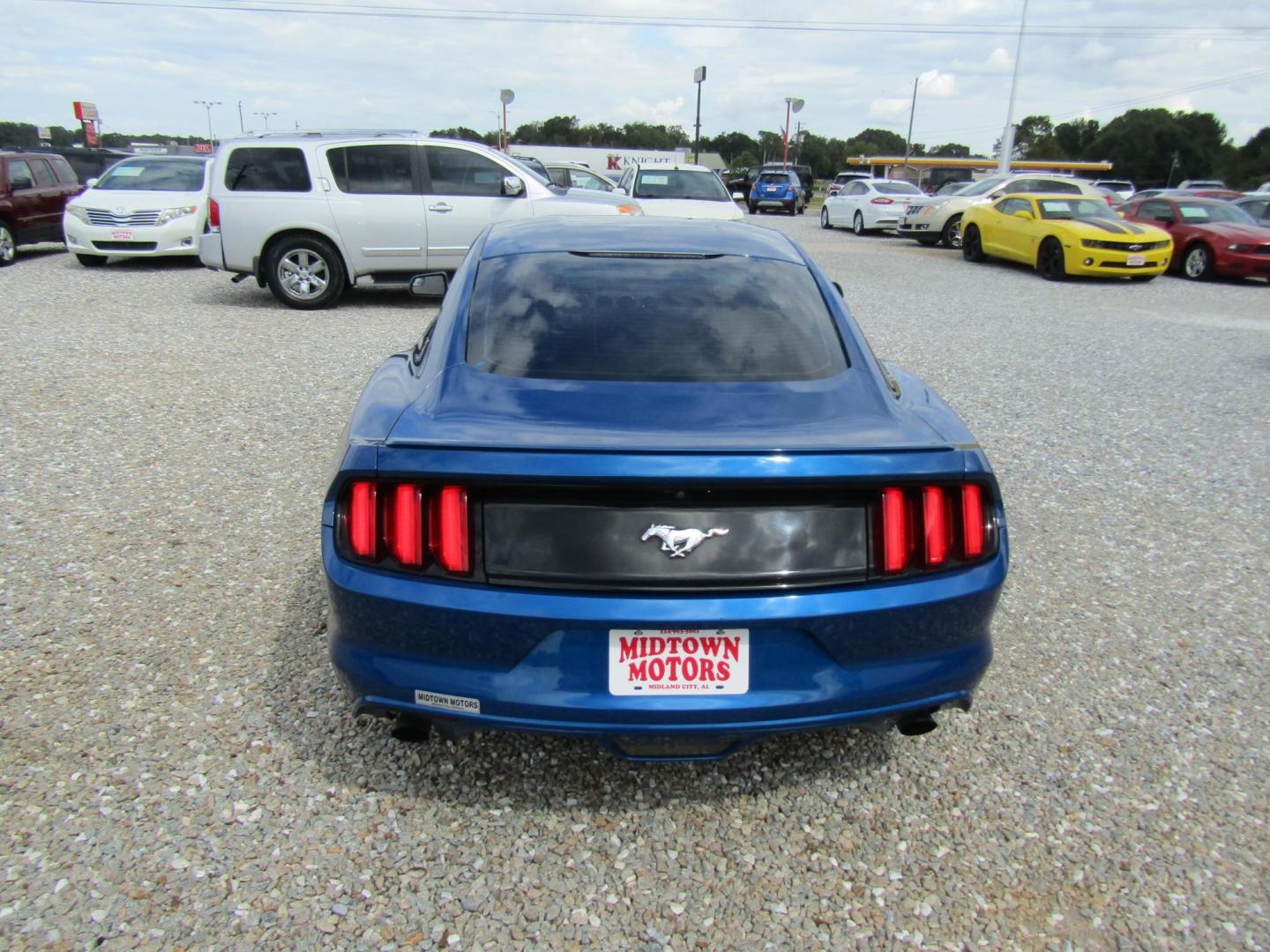 2017 Blue Ford Mustang EcoBoost Coupe (1FA6P8TH4H5) with an 2.3L L4 DOHC 16V engine, Automatic transmission, located at 15016 S Hwy 231, Midland City, AL, 36350, (334) 983-3001, 31.306210, -85.495277 - Photo#4