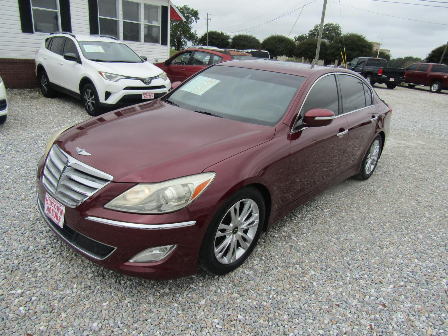 2013 Red Hyundai Genesis 3.8L (KMHGC4DD5DU) with an 3.8L V6 DOHC 24V engine, Automatic transmission, located at 15016 S Hwy 231, Midland City, AL, 36350, (334) 983-3001, 31.306210, -85.495277 - Photo#2