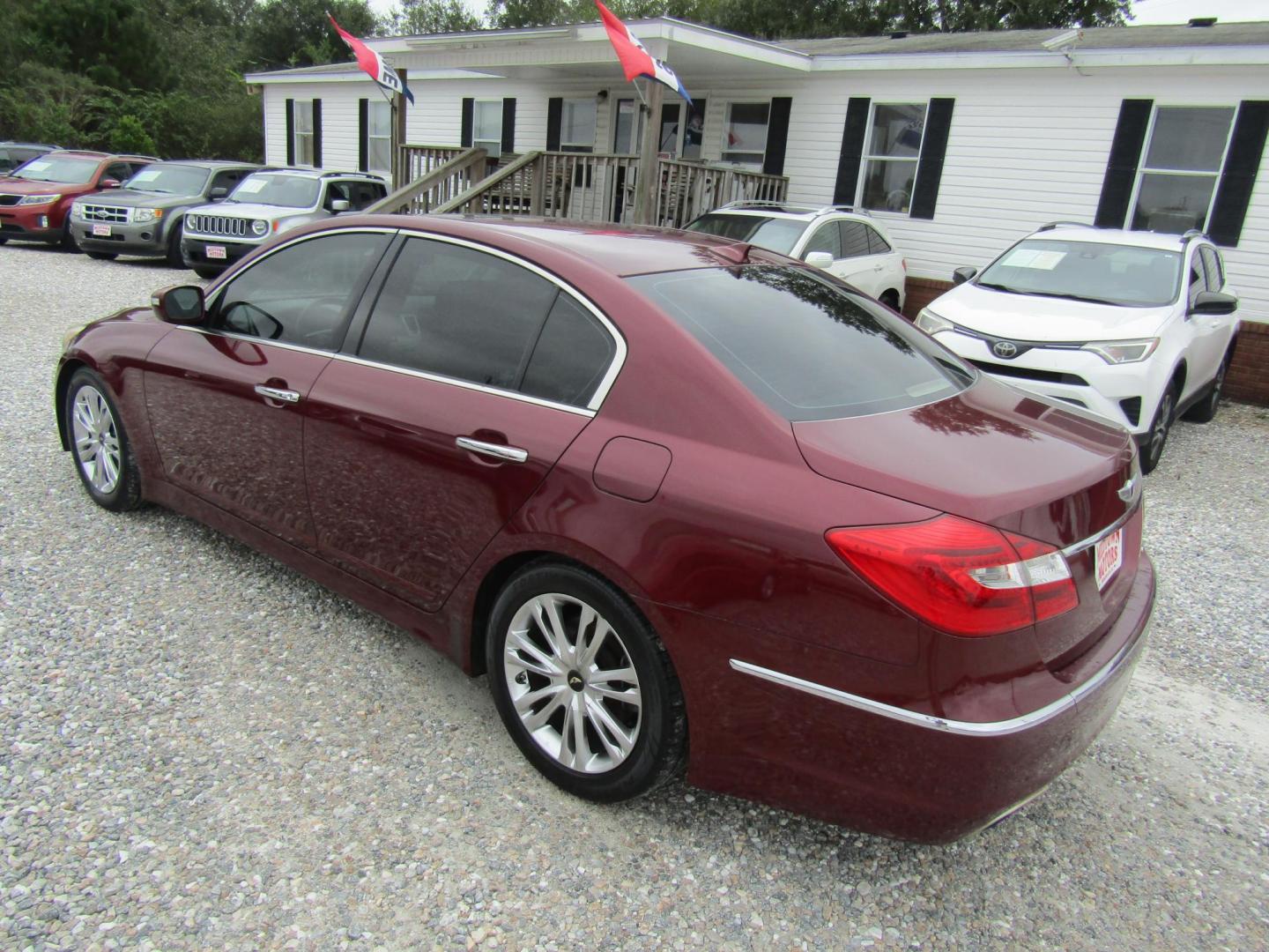 2013 Red Hyundai Genesis 3.8L (KMHGC4DD5DU) with an 3.8L V6 DOHC 24V engine, Automatic transmission, located at 15016 S Hwy 231, Midland City, AL, 36350, (334) 983-3001, 31.306210, -85.495277 - Photo#5