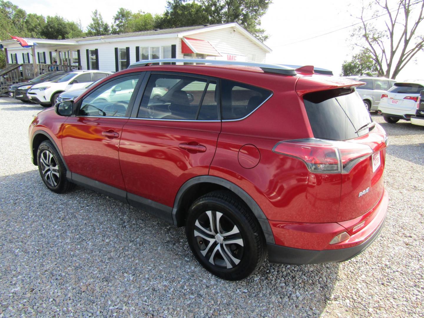 2016 Red Toyota RAV4 LE FWD (2T3ZFREV3GW) with an 2.5L L4 DOHC 16V engine, Automatic transmission, located at 15016 S Hwy 231, Midland City, AL, 36350, (334) 983-3001, 31.306210, -85.495277 - Photo#5