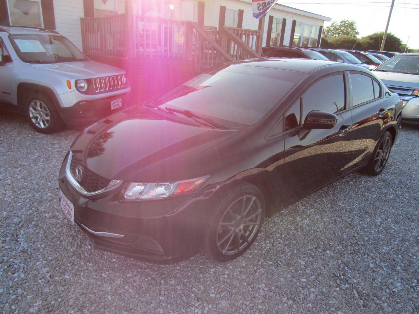 2015 Black Honda Civic LX Sedan CVT (19XFB2F54FE) with an 1.8L L4 SOHC 16V engine, Automatic transmission, located at 15016 S Hwy 231, Midland City, AL, 36350, (334) 983-3001, 31.306210, -85.495277 - Photo#2