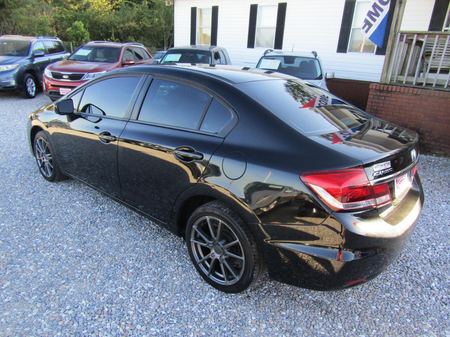 2015 Black Honda Civic LX Sedan CVT (19XFB2F54FE) with an 1.8L L4 SOHC 16V engine, Automatic transmission, located at 15016 S Hwy 231, Midland City, AL, 36350, (334) 983-3001, 31.306210, -85.495277 - Photo#5