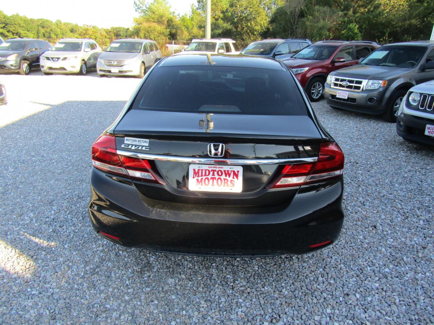 2015 Black Honda Civic LX Sedan CVT (19XFB2F54FE) with an 1.8L L4 SOHC 16V engine, Automatic transmission, located at 15016 S Hwy 231, Midland City, AL, 36350, (334) 983-3001, 31.306210, -85.495277 - Photo#6