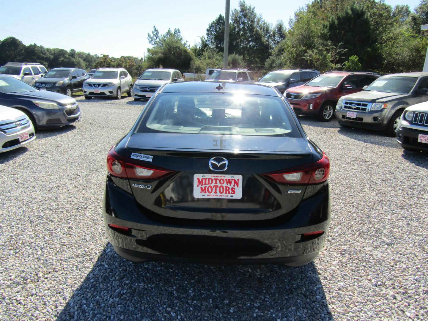 2016 Black Mazda MAZDA3 s Grand Touring AT 4-Door (JM1BM1W30G1) with an 2.5L L4 DOHC 16V engine, Automatic transmission, located at 15016 S Hwy 231, Midland City, AL, 36350, (334) 983-3001, 31.306210, -85.495277 - Photo#6
