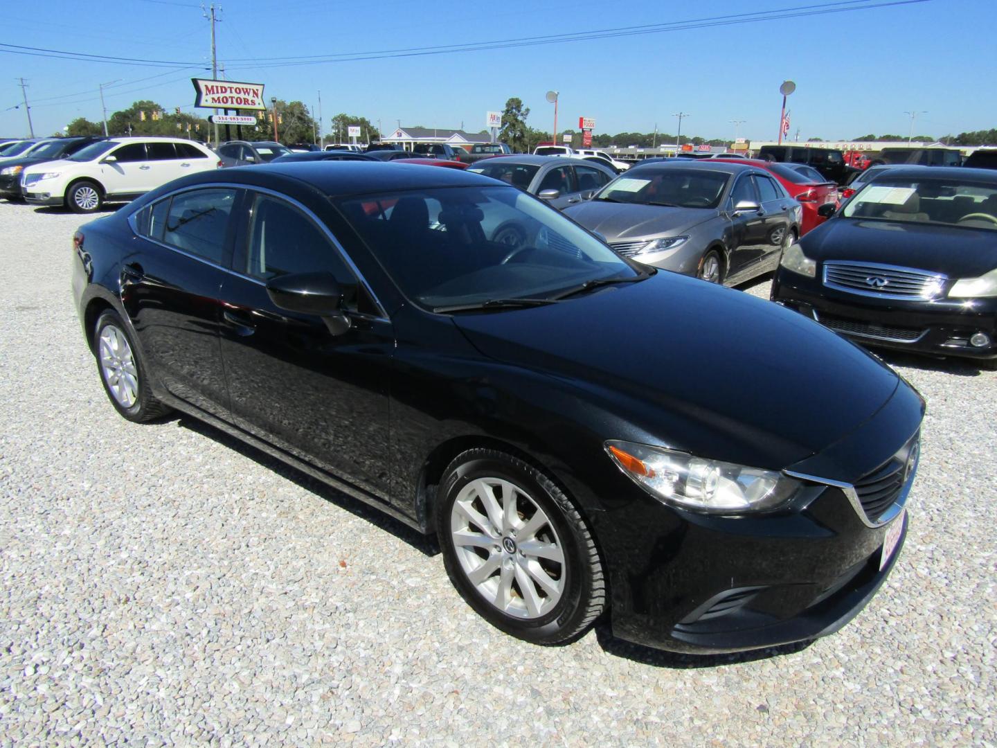 2014 Black Mazda Mazda6 i Sport AT (JM1GJ1U69E1) with an 2.5L L4 DOHC 16V engine, Automatic transmission, located at 15016 S Hwy 231, Midland City, AL, 36350, (334) 983-3001, 31.306210, -85.495277 - Photo#0