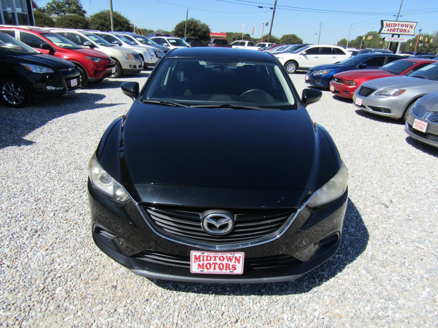 2014 Black Mazda Mazda6 i Sport AT (JM1GJ1U69E1) with an 2.5L L4 DOHC 16V engine, Automatic transmission, located at 15016 S Hwy 231, Midland City, AL, 36350, (334) 983-3001, 31.306210, -85.495277 - Photo#1