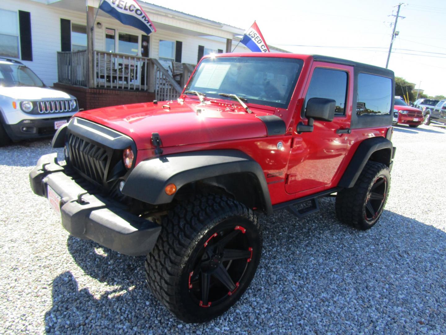 2015 Red Jeep Wrangler Sport 4WD (1C4AJWAG3FL) with an 3.6L V6 DOHC 24V FFV engine, Automatic transmission, located at 15016 S Hwy 231, Midland City, AL, 36350, (334) 983-3001, 31.306210, -85.495277 - Photo#2