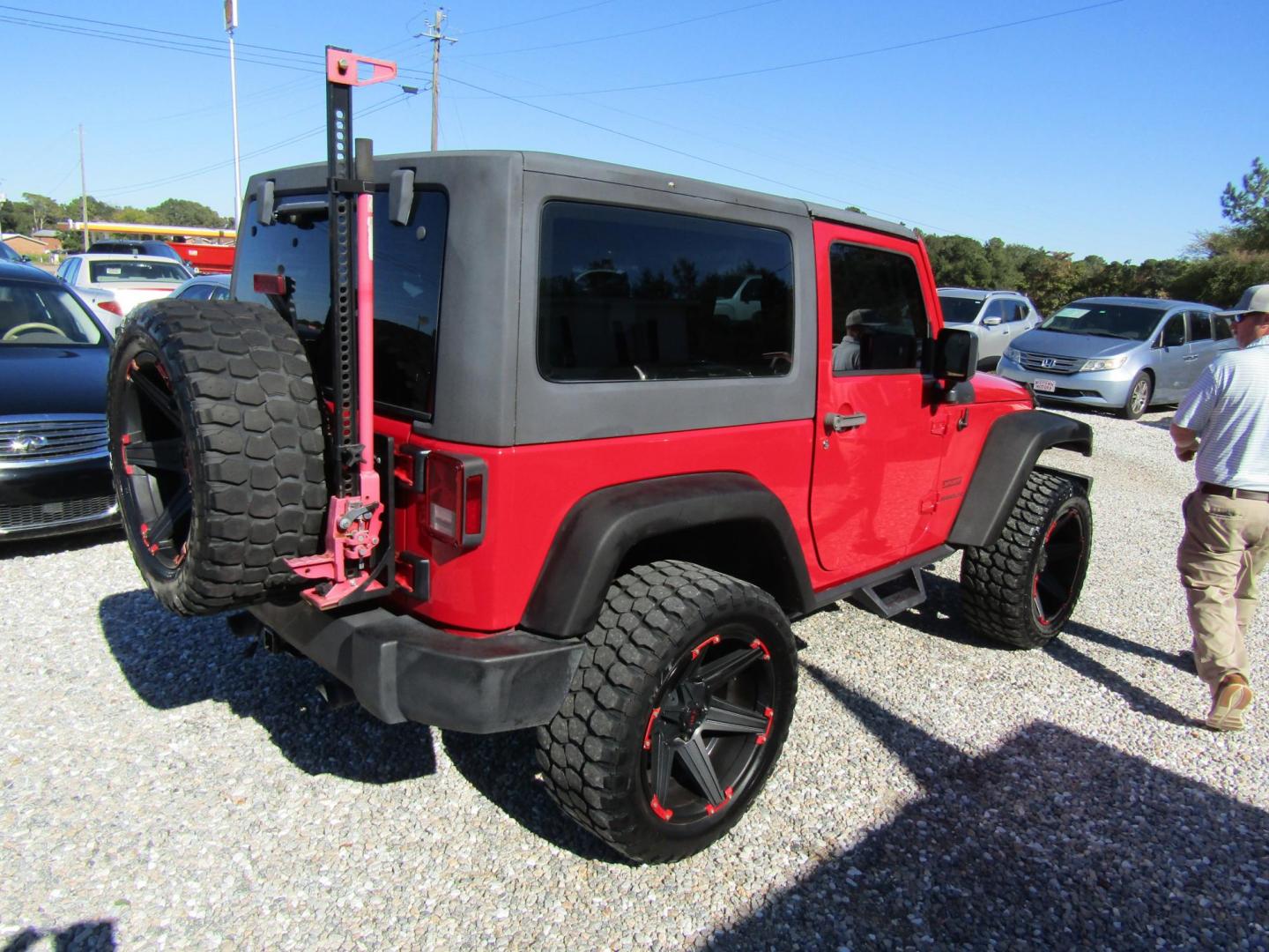 2015 Red Jeep Wrangler Sport 4WD (1C4AJWAG3FL) with an 3.6L V6 DOHC 24V FFV engine, Automatic transmission, located at 15016 S Hwy 231, Midland City, AL, 36350, (334) 983-3001, 31.306210, -85.495277 - Photo#6