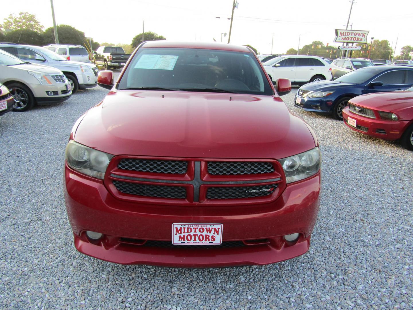 2013 Red Dodge Durango SXT RWD (1C4RDHAG7DC) with an 3.6L V6 DOHC 24V engine, Automatic transmission, located at 15016 S Hwy 231, Midland City, AL, 36350, (334) 983-3001, 31.306210, -85.495277 - Photo#1