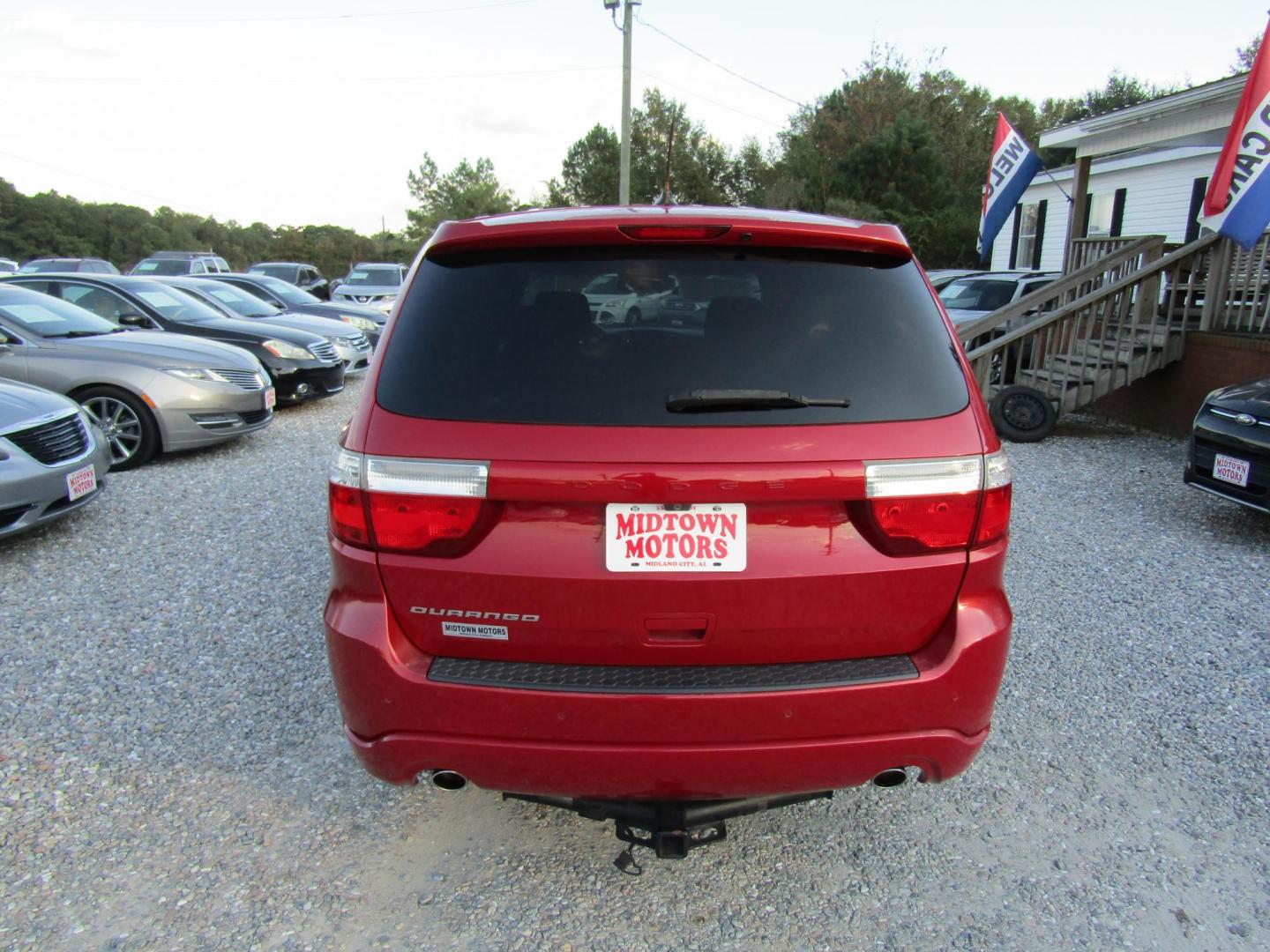 2013 Red Dodge Durango SXT RWD (1C4RDHAG7DC) with an 3.6L V6 DOHC 24V engine, Automatic transmission, located at 15016 S Hwy 231, Midland City, AL, 36350, (334) 983-3001, 31.306210, -85.495277 - Photo#6