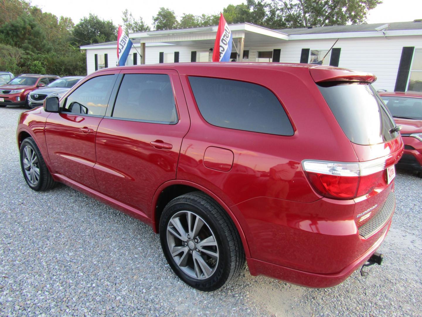 2013 Red Dodge Durango SXT RWD (1C4RDHAG7DC) with an 3.6L V6 DOHC 24V engine, Automatic transmission, located at 15016 S Hwy 231, Midland City, AL, 36350, (334) 983-3001, 31.306210, -85.495277 - Photo#5