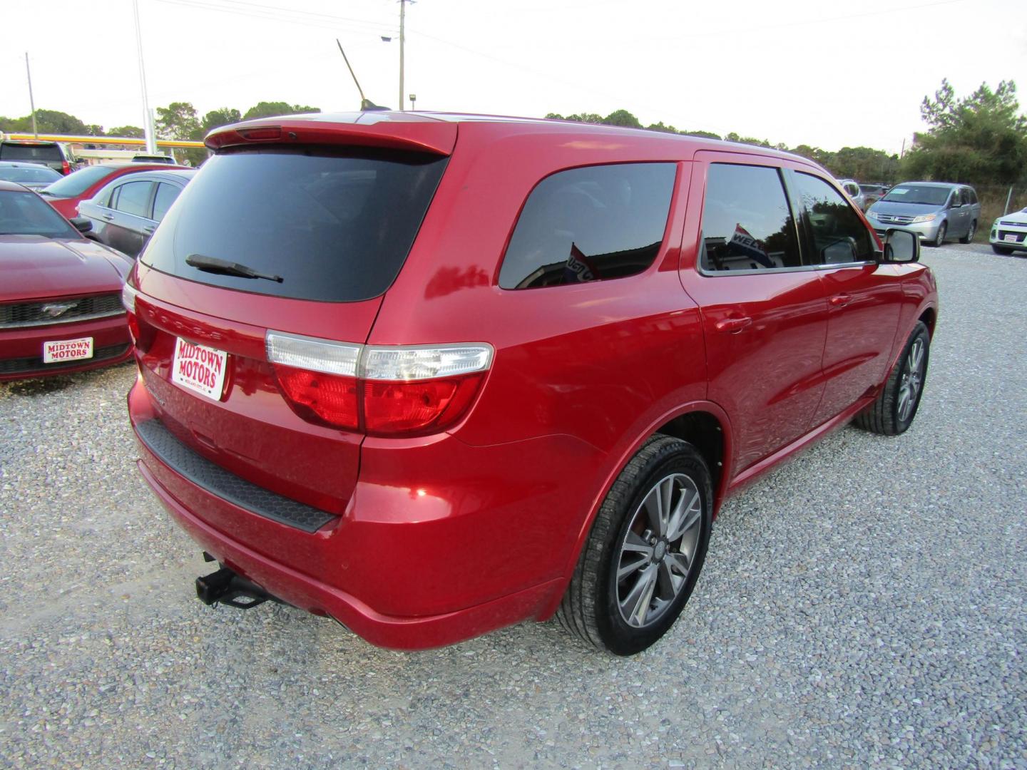 2013 Red Dodge Durango SXT RWD (1C4RDHAG7DC) with an 3.6L V6 DOHC 24V engine, Automatic transmission, located at 15016 S Hwy 231, Midland City, AL, 36350, (334) 983-3001, 31.306210, -85.495277 - Photo#7