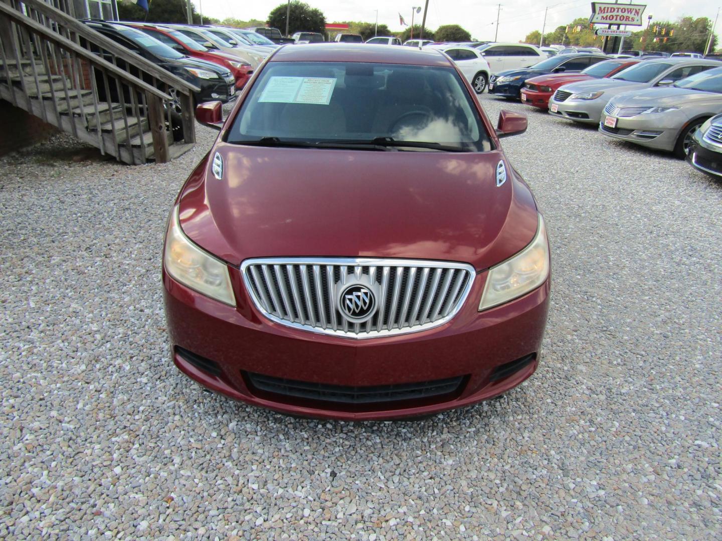 2010 Red Buick LaCrosse CX (1G4GB5EG9AF) with an 3.0L V6 DOHC 24V engine, Automatic transmission, located at 15016 S Hwy 231, Midland City, AL, 36350, (334) 983-3001, 31.306210, -85.495277 - Photo#1