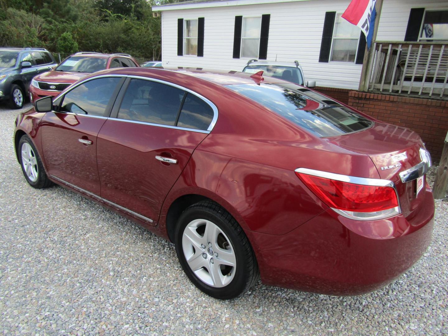 2010 Red Buick LaCrosse CX (1G4GB5EG9AF) with an 3.0L V6 DOHC 24V engine, Automatic transmission, located at 15016 S Hwy 231, Midland City, AL, 36350, (334) 983-3001, 31.306210, -85.495277 - Photo#5
