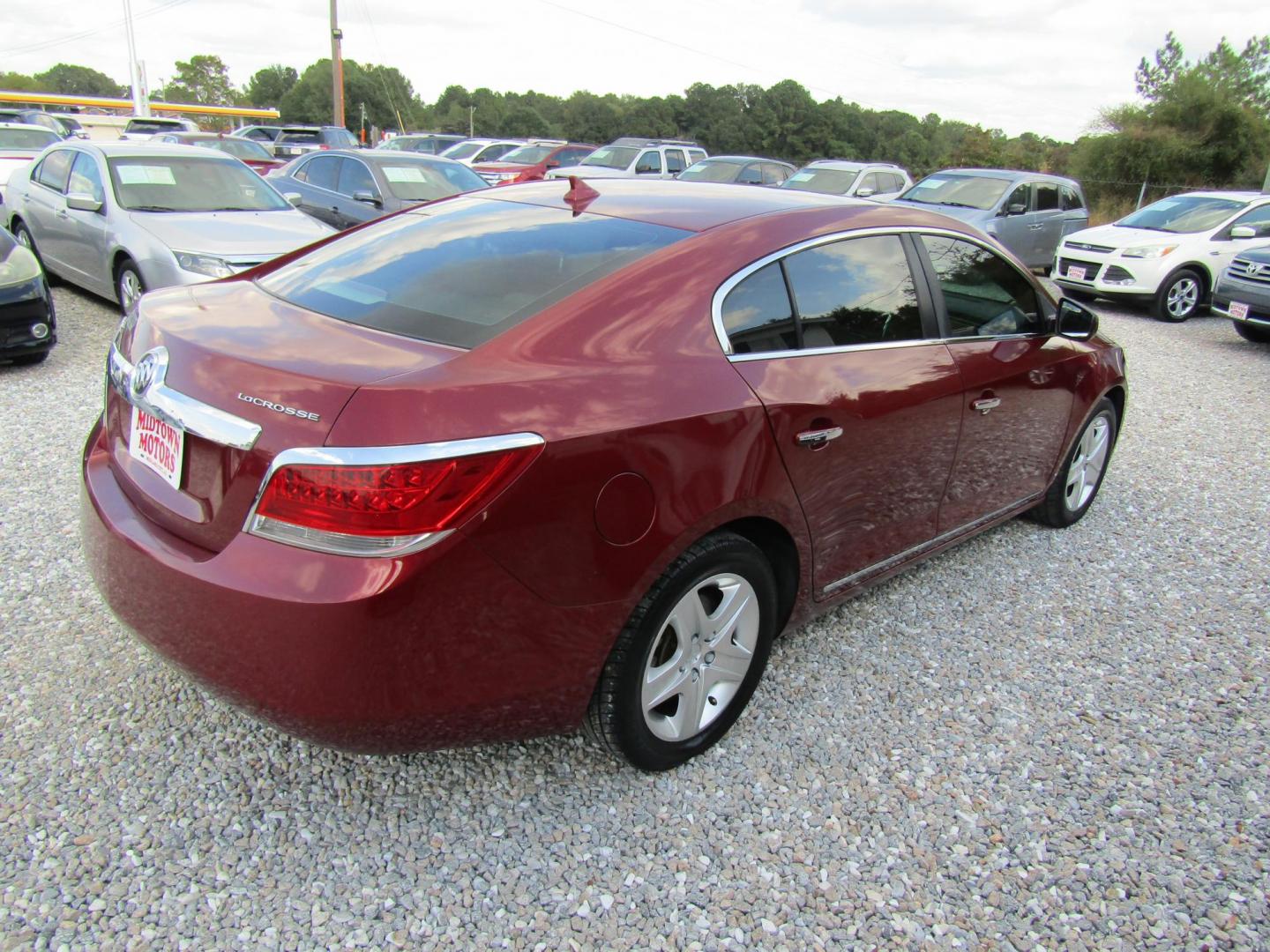 2010 Red Buick LaCrosse CX (1G4GB5EG9AF) with an 3.0L V6 DOHC 24V engine, Automatic transmission, located at 15016 S Hwy 231, Midland City, AL, 36350, (334) 983-3001, 31.306210, -85.495277 - Photo#7