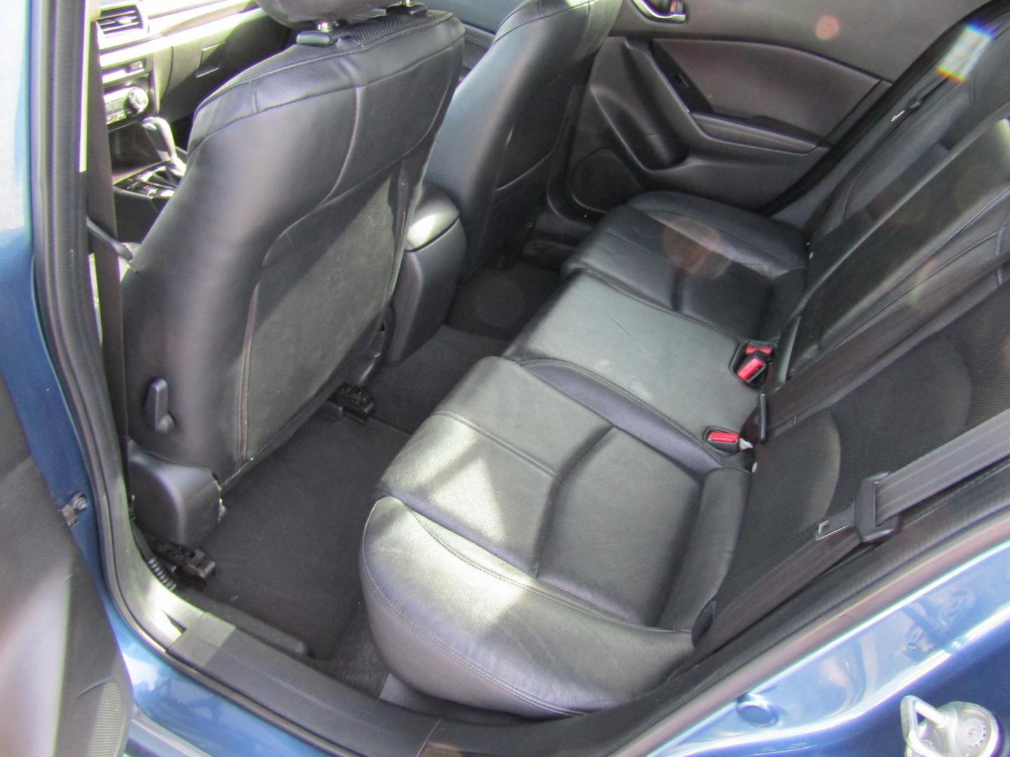 2017 Blue Mazda MAZDA3 s Grand Touring AT 4-Door (JM1BN1W31H1) with an 2.5L L4 DOHC 16V engine, Automatic transmission, located at 15016 S Hwy 231, Midland City, AL, 36350, (334) 983-3001, 31.306210, -85.495277 - Photo#4